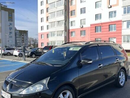 Чорний Міцубісі Грандіс, об'ємом двигуна 2.38 л та пробігом 238 тис. км за 5599 $, фото 1 на Automoto.ua