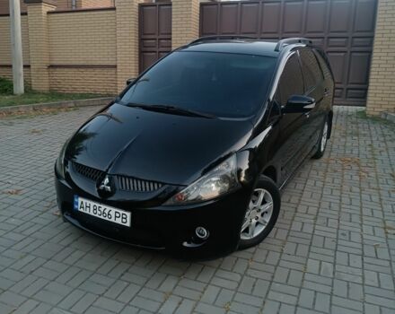 Черный Мицубиси Грандис, объемом двигателя 2.4 л и пробегом 270 тыс. км за 6000 $, фото 1 на Automoto.ua