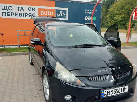 Чорний Міцубісі Грандіс, об'ємом двигуна 2.4 л та пробігом 144 тис. км за 7300 $, фото 1 на Automoto.ua