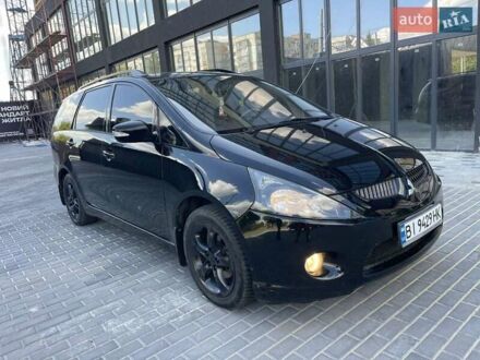 Чорний Міцубісі Грандіс, об'ємом двигуна 2.38 л та пробігом 250 тис. км за 5600 $, фото 1 на Automoto.ua