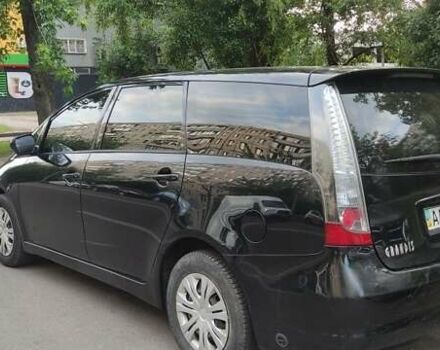 Черный Мицубиси Грандис, объемом двигателя 2.4 л и пробегом 380 тыс. км за 4400 $, фото 1 на Automoto.ua