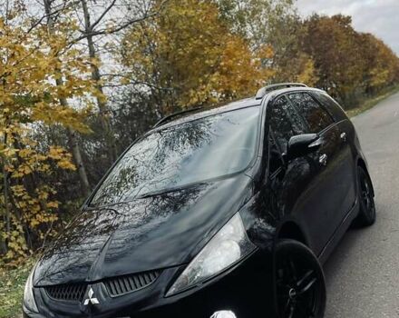 Черный Мицубиси Грандис, объемом двигателя 2.4 л и пробегом 260 тыс. км за 6499 $, фото 1 на Automoto.ua