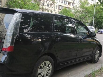 Черный Мицубиси Грандис, объемом двигателя 2.4 л и пробегом 380 тыс. км за 4400 $, фото 1 на Automoto.ua