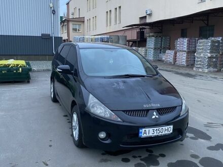 Черный Мицубиси Грандис, объемом двигателя 2.4 л и пробегом 360 тыс. км за 5000 $, фото 1 на Automoto.ua
