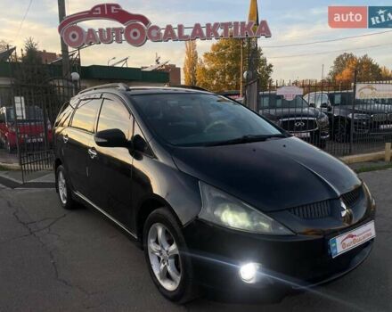 Черный Мицубиси Грандис, объемом двигателя 2.38 л и пробегом 197 тыс. км за 5299 $, фото 1 на Automoto.ua