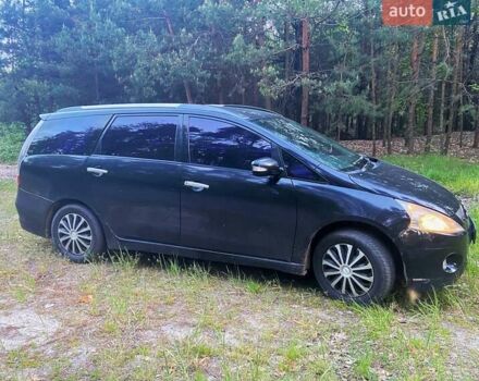 Черный Мицубиси Грандис, объемом двигателя 2.4 л и пробегом 209 тыс. км за 5500 $, фото 1 на Automoto.ua