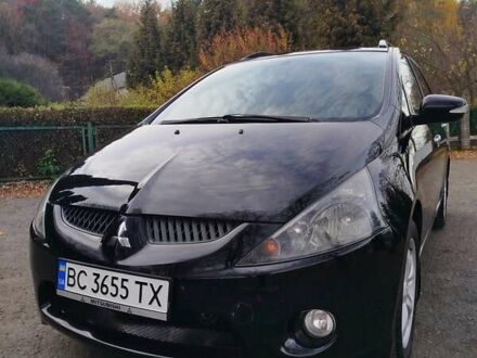 Черный Мицубиси Грандис, объемом двигателя 2.38 л и пробегом 215 тыс. км за 5900 $, фото 1 на Automoto.ua