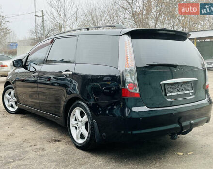 Черный Мицубиси Грандис, объемом двигателя 2.4 л и пробегом 188 тыс. км за 6800 $, фото 1 на Automoto.ua