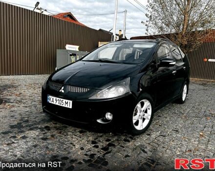 Черный Мицубиси Грандис, объемом двигателя 2.4 л и пробегом 326 тыс. км за 7000 $, фото 1 на Automoto.ua