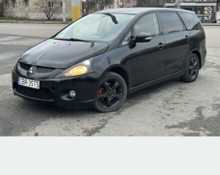 Черный Мицубиси Грандис, объемом двигателя 2 л и пробегом 290 тыс. км за 2600 $, фото 1 на Automoto.ua