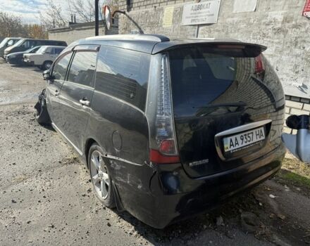 Черный Мицубиси Грандис, объемом двигателя 2.4 л и пробегом 220 тыс. км за 3200 $, фото 1 на Automoto.ua
