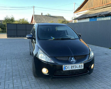 Чорний Міцубісі Грандіс, об'ємом двигуна 2.4 л та пробігом 290 тис. км за 4600 $, фото 1 на Automoto.ua