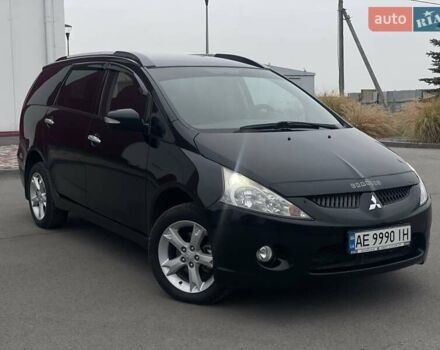 Черный Мицубиси Грандис, объемом двигателя 2.4 л и пробегом 144 тыс. км за 9700 $, фото 1 на Automoto.ua