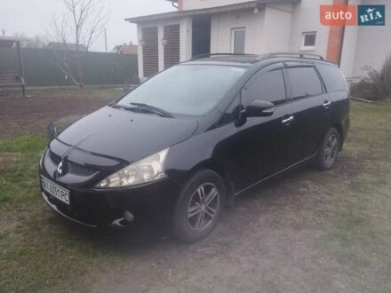 Черный Мицубиси Грандис, объемом двигателя 2.4 л и пробегом 340 тыс. км за 5500 $, фото 1 на Automoto.ua