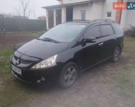 Черный Мицубиси Грандис, объемом двигателя 2.4 л и пробегом 340 тыс. км за 5500 $, фото 1 на Automoto.ua