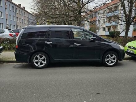 Черный Мицубиси Грандис, объемом двигателя 2.4 л и пробегом 164 тыс. км за 6500 $, фото 1 на Automoto.ua