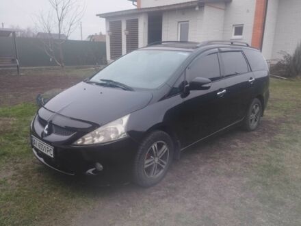 Черный Мицубиси Грандис, объемом двигателя 2.4 л и пробегом 340 тыс. км за 55000 $, фото 1 на Automoto.ua