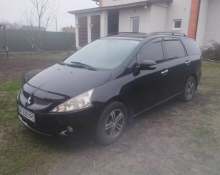 Черный Мицубиси Грандис, объемом двигателя 2.4 л и пробегом 340 тыс. км за 55000 $, фото 1 на Automoto.ua