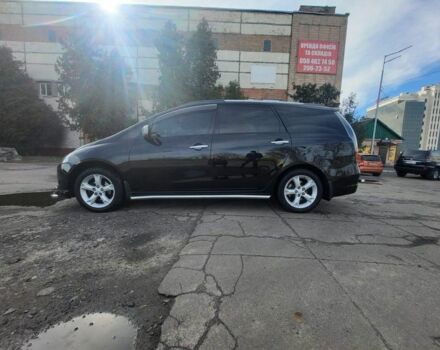 Чорний Міцубісі Грандіс, об'ємом двигуна 2.4 л та пробігом 150 тис. км за 10500 $, фото 1 на Automoto.ua