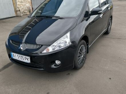 Черный Мицубиси Грандис, объемом двигателя 2.4 л и пробегом 62 тыс. км за 8500 $, фото 1 на Automoto.ua