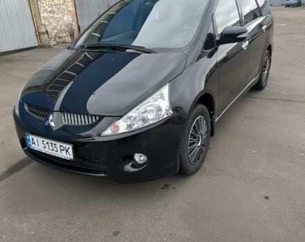 Черный Мицубиси Грандис, объемом двигателя 2.4 л и пробегом 62 тыс. км за 8500 $, фото 1 на Automoto.ua