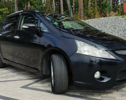Черный Мицубиси Грандис, объемом двигателя 2 л и пробегом 245 тыс. км за 6400 $, фото 1 на Automoto.ua