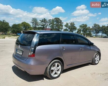 Фиолетовый Мицубиси Грандис, объемом двигателя 2.4 л и пробегом 327 тыс. км за 5300 $, фото 11 на Automoto.ua