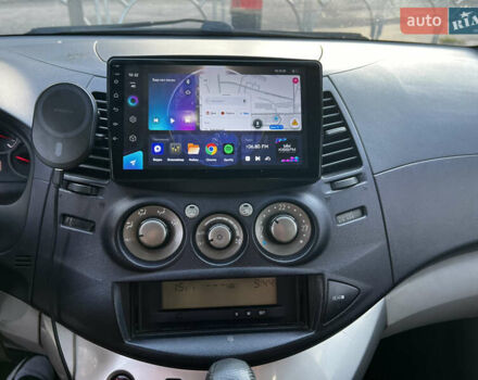 Фиолетовый Мицубиси Грандис, объемом двигателя 2.4 л и пробегом 417 тыс. км за 6500 $, фото 16 на Automoto.ua