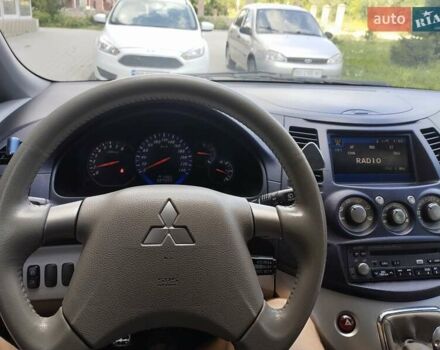 Фиолетовый Мицубиси Грандис, объемом двигателя 2.4 л и пробегом 327 тыс. км за 5300 $, фото 13 на Automoto.ua