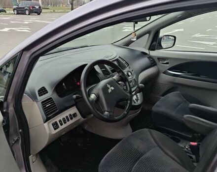 Фиолетовый Мицубиси Грандис, объемом двигателя 2.4 л и пробегом 257 тыс. км за 5400 $, фото 6 на Automoto.ua