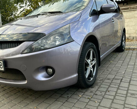 Фиолетовый Мицубиси Грандис, объемом двигателя 2.38 л и пробегом 261 тыс. км за 5400 $, фото 1 на Automoto.ua