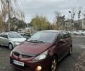 Красный Мицубиси Грандис, объемом двигателя 2.4 л и пробегом 300 тыс. км за 4850 $, фото 1 на Automoto.ua