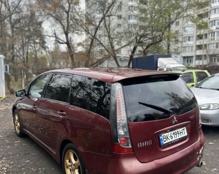 Красный Мицубиси Грандис, объемом двигателя 2.4 л и пробегом 300 тыс. км за 4850 $, фото 2 на Automoto.ua