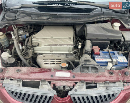 Красный Мицубиси Грандис, объемом двигателя 2.38 л и пробегом 117 тыс. км за 6999 $, фото 5 на Automoto.ua