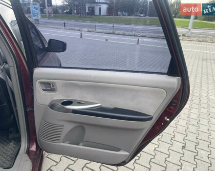 Красный Мицубиси Грандис, объемом двигателя 2.38 л и пробегом 117 тыс. км за 6999 $, фото 12 на Automoto.ua