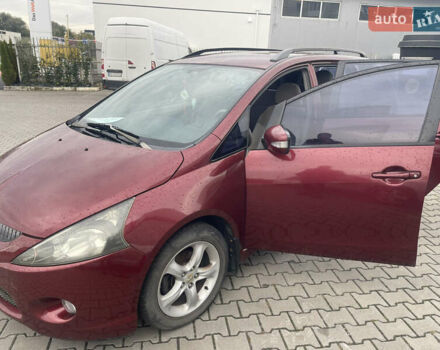 Красный Мицубиси Грандис, объемом двигателя 2.38 л и пробегом 117 тыс. км за 6999 $, фото 6 на Automoto.ua