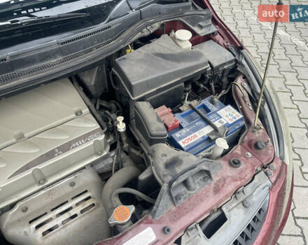 Красный Мицубиси Грандис, объемом двигателя 2.38 л и пробегом 117 тыс. км за 6999 $, фото 4 на Automoto.ua