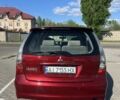Красный Мицубиси Грандис, объемом двигателя 2.4 л и пробегом 313 тыс. км за 3999 $, фото 5 на Automoto.ua