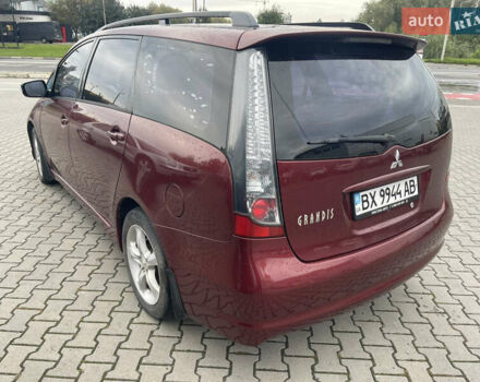Красный Мицубиси Грандис, объемом двигателя 2.38 л и пробегом 117 тыс. км за 6999 $, фото 2 на Automoto.ua
