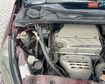 Красный Мицубиси Грандис, объемом двигателя 2.38 л и пробегом 117 тыс. км за 6999 $, фото 3 на Automoto.ua