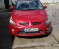 Красный Мицубиси Грандис, объемом двигателя 1.97 л и пробегом 235 тыс. км за 7100 $, фото 1 на Automoto.ua