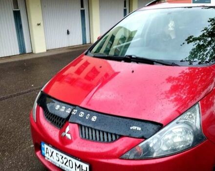 Красный Мицубиси Грандис, объемом двигателя 2.4 л и пробегом 220 тыс. км за 6100 $, фото 1 на Automoto.ua