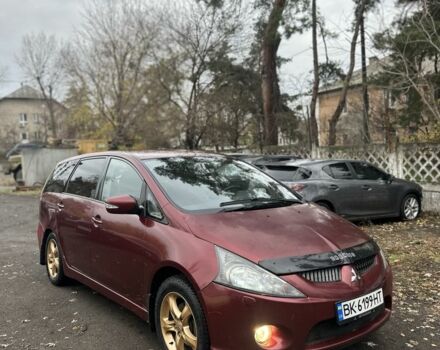 Червоний Міцубісі Грандіс, об'ємом двигуна 2.4 л та пробігом 300 тис. км за 4850 $, фото 1 на Automoto.ua