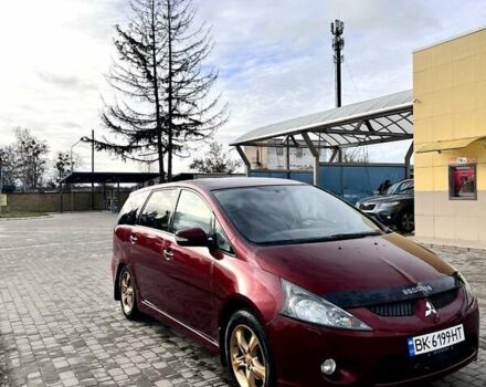 Красный Мицубиси Грандис, объемом двигателя 2.38 л и пробегом 341 тыс. км за 3900 $, фото 1 на Automoto.ua