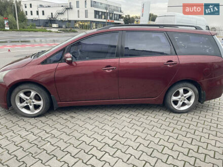 Красный Мицубиси Грандис, объемом двигателя 2.38 л и пробегом 117 тыс. км за 6999 $, фото 1 на Automoto.ua