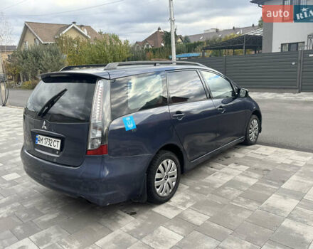 Сірий Міцубісі Грандіс, об'ємом двигуна 2.4 л та пробігом 396 тис. км за 3999 $, фото 6 на Automoto.ua