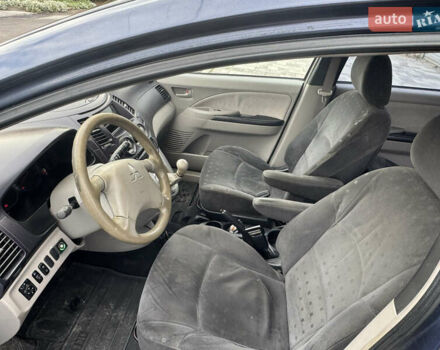 Сірий Міцубісі Грандіс, об'ємом двигуна 2.4 л та пробігом 396 тис. км за 3999 $, фото 32 на Automoto.ua