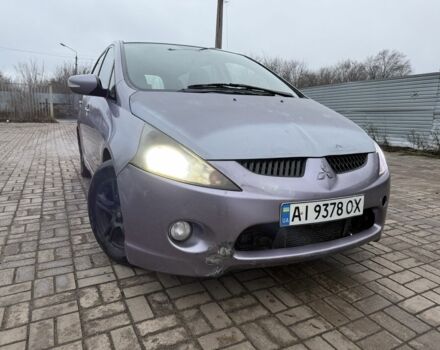 Серый Мицубиси Грандис, объемом двигателя 2 л и пробегом 200 тыс. км за 2450 $, фото 1 на Automoto.ua