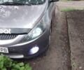 Серый Мицубиси Грандис, объемом двигателя 2.4 л и пробегом 219 тыс. км за 6950 $, фото 1 на Automoto.ua