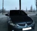 Серый Мицубиси Грандис, объемом двигателя 2 л и пробегом 200 тыс. км за 4800 $, фото 1 на Automoto.ua